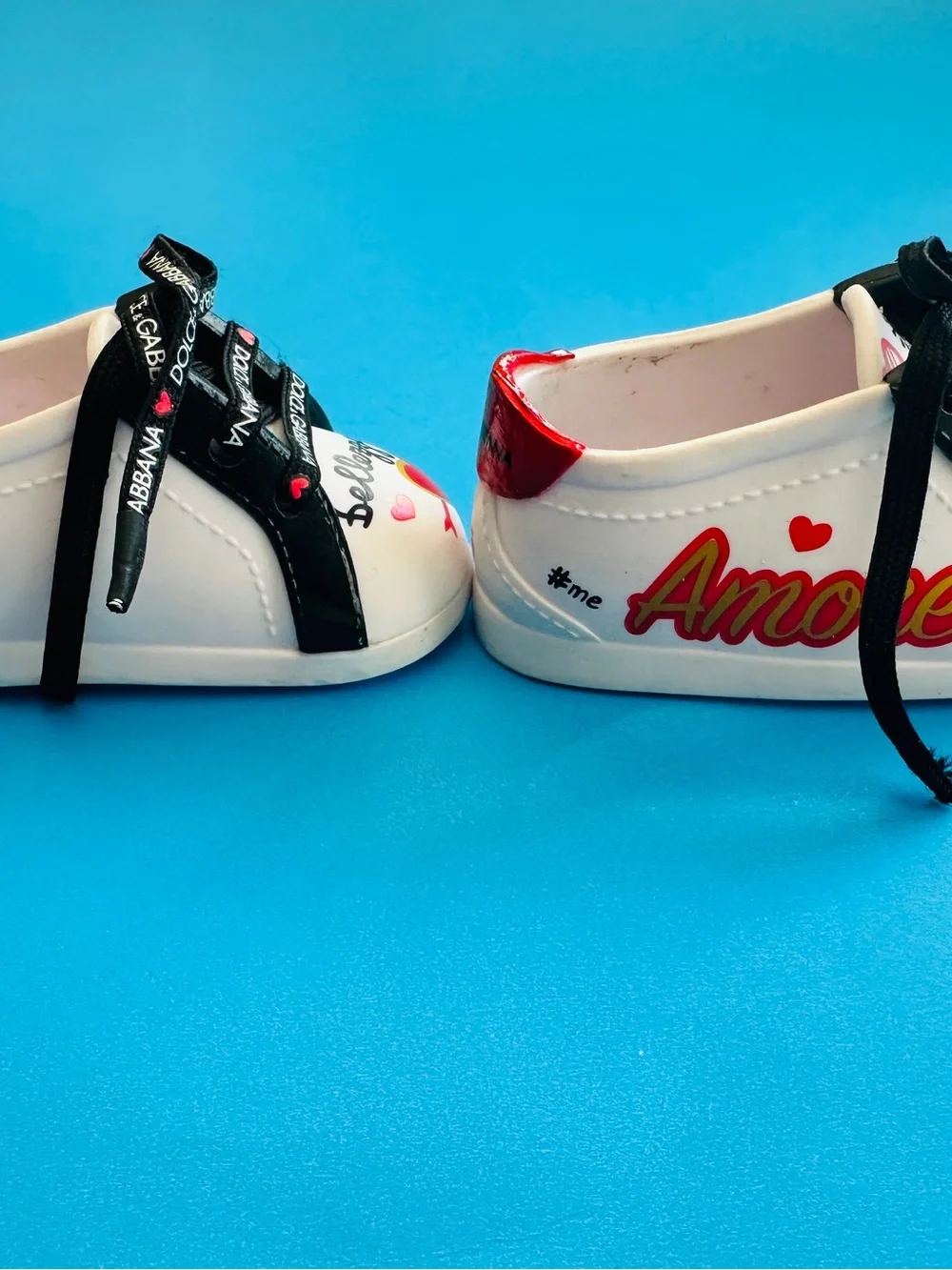 Dolce & Gabbana Doll White Sneakers with Black Laces and Red Heart Accents